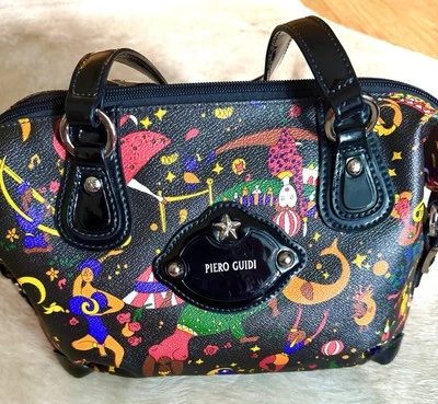 Cartera mediana de cuero Piero Guidi Black Magic Circus  Foto 1 de 4