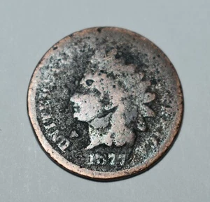 158x. AN 1877 INDIAN HEAD CENT, DATED 1877, CONDITION IS AS SHOWN, AS-IS, SCARCE - Picture 1 of 2