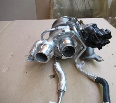 Turbolader Garrett (Neu - Take off) mit Benzinleitung Nr. 8651261; Ölleitung ... - Bild 1 von 2