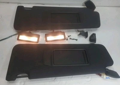 09-15 BMW 740i 750Li 750i 760 Juego de parasol iluminado izquierdo derecho OEM negro PROBADO Foto 1 de 4
