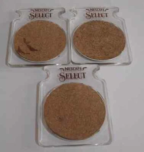 JUEGO DE TRES POSAVASOS PUBLICITARIOS NESTLE NESCAFE SELECT CORCHO Y PLÁSTICO CON LOGO - Imagen 1 de 5