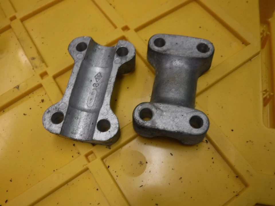 8H5-1979- YAMAHA 340 Enticer snowmobile parts: HANDLEBAR CLAMPS - Image 1 of 1