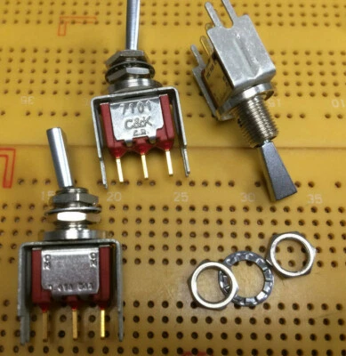 SPDT Toggle Switch On-On Flat Latching PCB Panel IP67 Gold C&K 7101 Multi Qty - Image 1 of 4