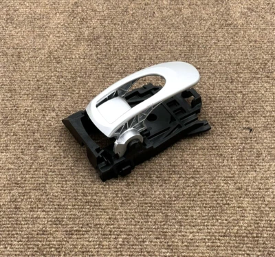 Mitsubishi Eclipse 2006-2012 manija de puerta interior del conductor delantero izquierdo plateada #2 Foto 1 de 4