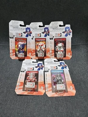 Transformers 30th Anniversary Figurine w/ 3D Puzzle Piece & Base 5 Pack - Image 1 of 4