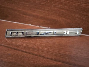 Mazda Vintage Metal Emblem Badge Genuine - Foto 1 di 13