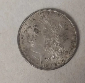 1884 Silver Dollar - Picture 1 of 4