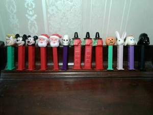 13 Vintage Pez dispensers Holiday lot - Santa, Witch, Skull, Bunny, Lamb, Vader - Picture 1 of 4