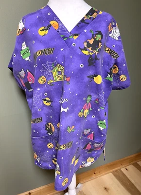 Cherokee Womens Halloween Scrub Top Purple With Characters Size XL - Image 1 of 4