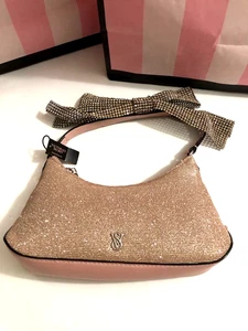 Borsa Victoria's Secret rosa scintillante con cinturino fiocco diamantato nuova con etichetta - Foto 1 di 4