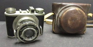 Fotocamera pellicola Wirgin 127 e obiettivo Meyer Trioplan 5 cm f/2.9 e custodia Gewirette pulita - Foto 1 di 8