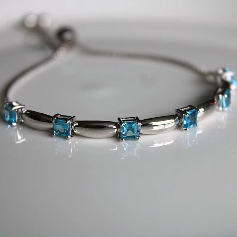 Princess Simulated Blue Topaz Women's Stunning Bracelet In 14k White Gold Plated - Image 1 of 4