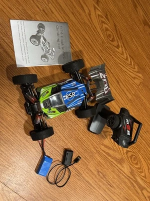 Wltoys 144001 1/14 RC Car Speed 60km/H 2.4GHz 4WD Off-Road Green - Image 1 of 4