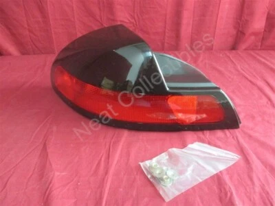 Lámpara de luz trasera izquierda NOS OEM Dodge Avenger 1995-96 Foto 1 de 4