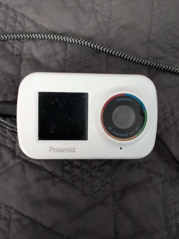 Cámara de acción Polaroid 4k Ultra HD doble pantalla impermeable Wifi ligeramente usada probada Foto 1 de 4