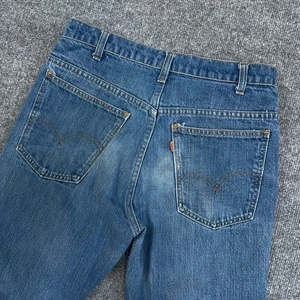 Jeans vintage Levis 646 uomo 30x30 arancione linguetta fondo a campana invecchiato anni 70 USA LEGGI - Foto 1 di 10