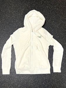 NUOVA felpa Hollister foderata in pelliccia sintetica con cappuccio e zip donna taglia (L) + spedizione gratuita - Foto 1 di 3