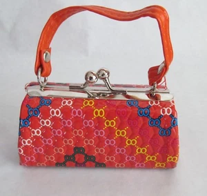 Cartera con estampado de cadena naranja se adapta a muñecas chicas americanas de 18 - Imagen 1 de 1