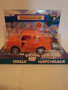 The Chevron Cars - Holly Hatchback - Orange Collectible Car w/ Dog Companion NIB - Picture 1 of 6