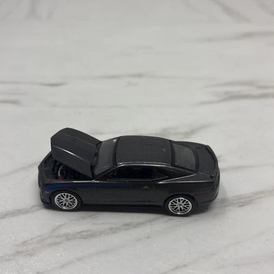 Coche Hennessey Camaro 2011 3" Auto World escala 1/64 gris fundido a presión Foto 1 de 4