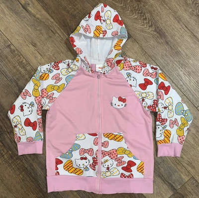 Sanrio HELLO KITTY Rosa Sudadera con Capucha CHAQUETA CREMALLERA Colorido Lazos Niña Talla 140 EE. UU. 8/10 Foto 1 de 4