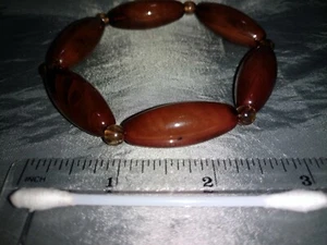 Vintage Bakelite? Lucite? Amber colored eleatic bracelet - Picture 1 of 5