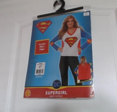 DISFRAZ MUJER SUPERGIRL ADULTO - CAMISA CON CAPA DESMONTABLE - PEQUEÑO (6-10) - NUEVO CON ETIQUETAS Foto 1 de 3