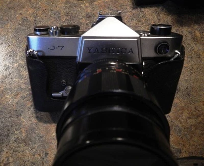 Yashica J7 VINTAGE SLR Camera  w/ lenses, extra lots of extras/supplies/case - Image 1 of 4