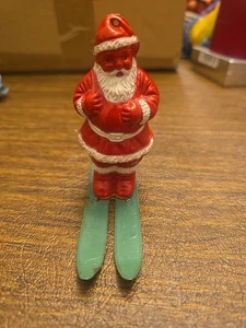 Vintage 1930er Irwin Hartplastik Weihnachtsmann auf Metall Ski mit Süßigkeiten Behälter USA - Bild 1 von 7