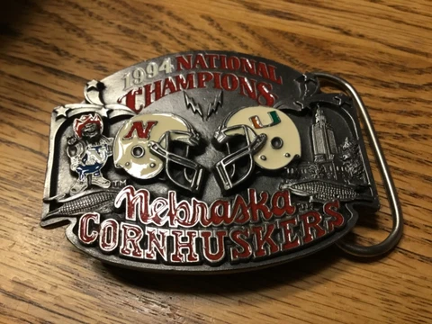 Nebraska cornhuskers belt buckle. 1994 national  Champions in original velvet ba Cover