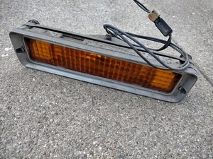 1976 ELDORADO LEFT FRONT MARKER SIGNAL LIGHT BUMPER MOUNT OEM USED CADILLAC PART - Picture 1 of 6