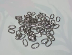 50pz anellini ovale in acciaio inox colore argento scuro 8x5mm bijoux - Foto 1 di 1