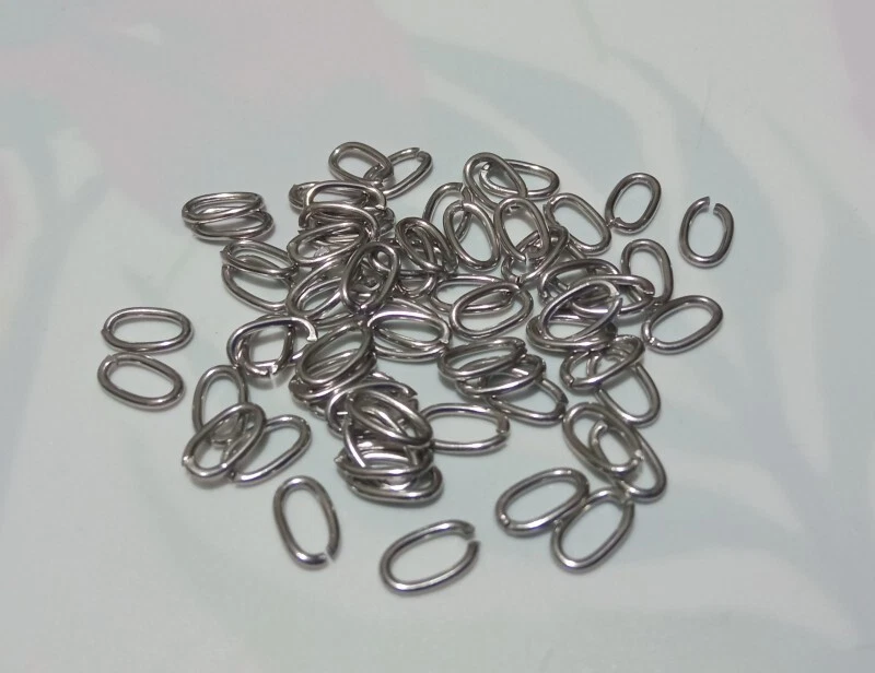 50pz anellini ovale in acciaio inox colore argento scuro 8x5mm bijoux - Immagine 1 di 1