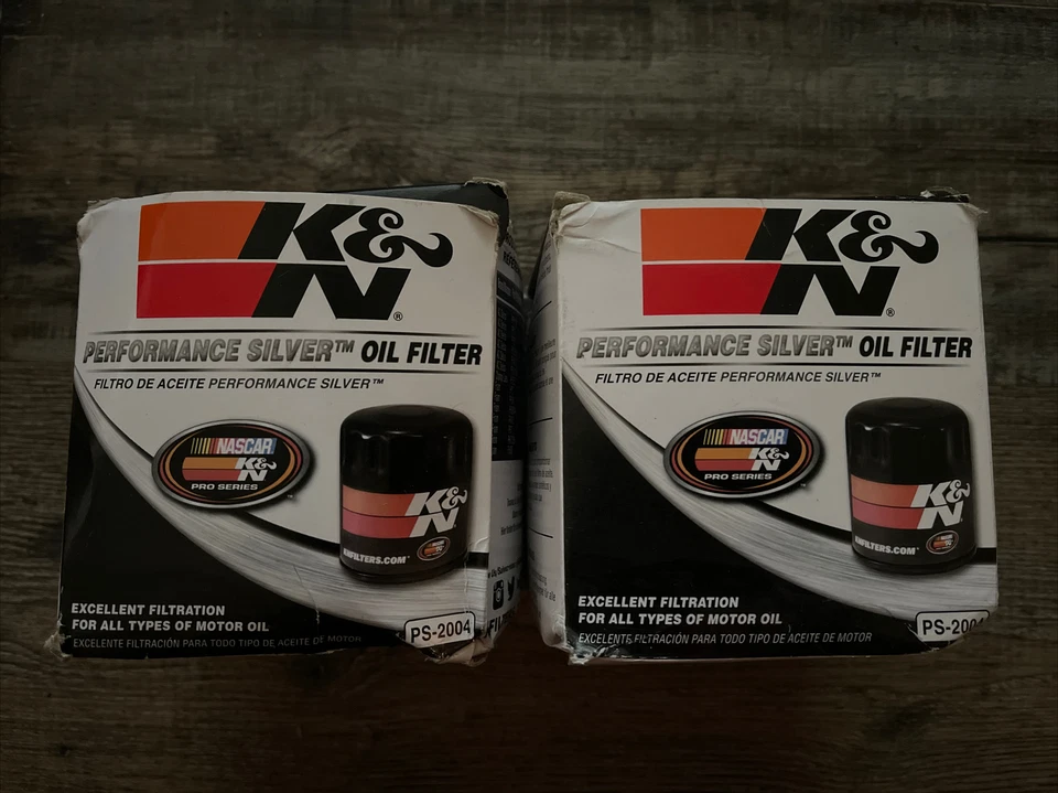 Cantidad 2.  Filtro de aceite plateado K&N Performance PS-2004 NASCAR Pro Series Jeep Foto 1 de 1