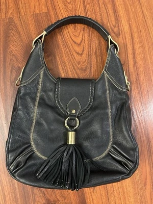 Oryany Black Leather Hobo Bag with Tassel Detailing Western Boho Magnetic Clasps - Image 1 of 4