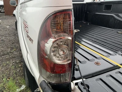 Driver Left Tail Light With LED OEM 08-15 TACOMA 1349329 - Image 1 of 4