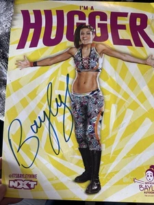 BAYLEY SIGNED OFFICIAL WWE 11x14 PHOTO AUTOGRAPHED OFFICIAL MERCH - Picture 1 of 5