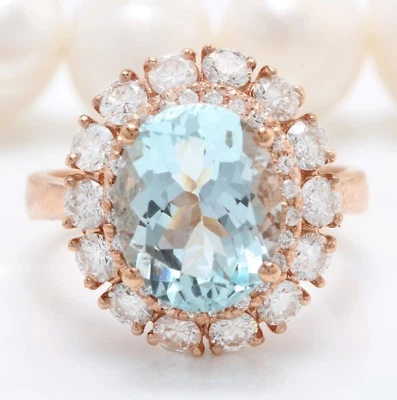 Anillo de oro rosa macizo de 14 quilates de aguamarina azul natural y diamantes de 4,60 quilates Foto 1 de 4