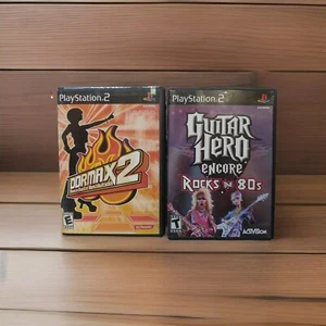 GUITAR HERO ENCORE & DDRMAX 2 Dance Dance Revolution (Sony PlayStation 2, 2003) - Bild 1 von 4