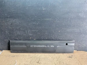 1993-1996 Toyota Corolla Sedan Rear Center Garnish Panel 76801-12420 D2130 - Picture 1 of 11