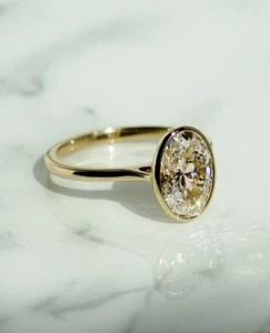 3Ct Oval-Cut Moissanite Bezel Set Engagement Ring 14k Yellow Gold Plated - Picture 1 of 4