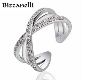 Anello a fascia intrecciato in argento 925 con zircone A+++ di eccezionale luce - Immagine 1 di 4