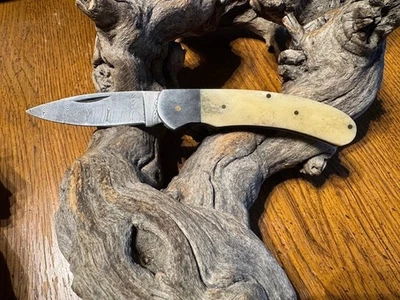 Big Damascus folding blade knife w/ white bone  handle - Image 1 of 4