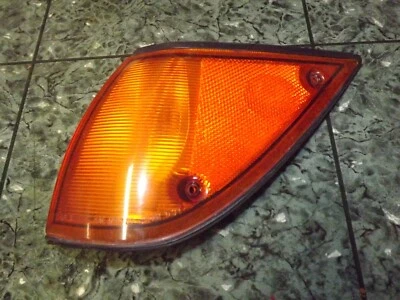 OEM USDM 85-90 Isuzu I-Mark imark luz de esquina frontal lente lámpara Koito 212-21410 L Foto 1 de 4