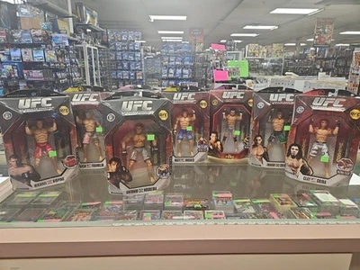 UFC Ultimate Collector Series jakks Action Figures Set Lot 8 Silva, Penn, Guida - Image 1 of 4