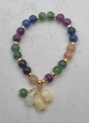 BRACCIALE ELASTICO VERDE MULTICOLORE, bracciale boho - Immagine 1 di 4