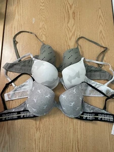 Pacchetto di 3 magliette donna Victoria’s Secret e push up ovunque grigie taglia 32D - Foto 1 di 10