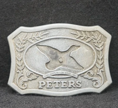 WC05171 COOL VINTAGE 1975 ****PETERS - MUNIÇÃO FINA**** FIVELA DE CINTO ARMAS DE FOGO - Imagem 1 de 2