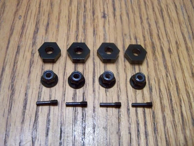 Axial UTB10 Capra 1.9 4WS 12mm Aluminum Wheel Hex Hubs Screw Pins & Nuts - Image 1 of 2