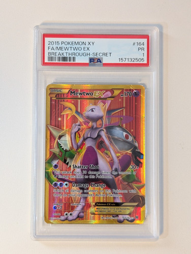2015 Pokémon XY Breakthrough PSA 1 Mewtwo EX holo full art secret rare Pokémon card with gold border and attack text.